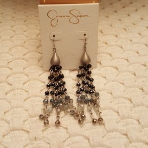 Jessica Simpson long multi color stone earrings.